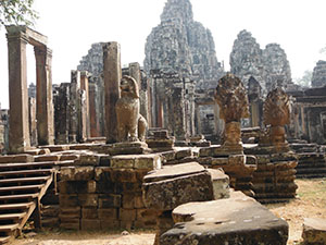 One of Angkor Wat temple in nature with big tree with scaffolding